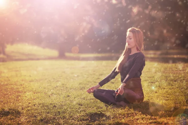 woman practicing morning meditation in nature