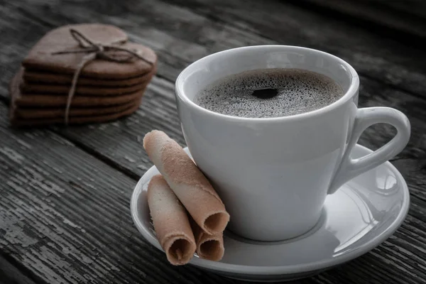 White cup of coffee with biscuits. — Stock Photo, Image