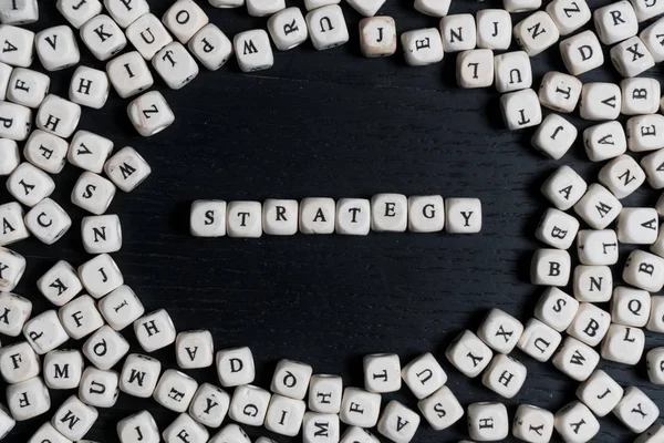 Strategy word made from toy cubes — Stock Photo, Image