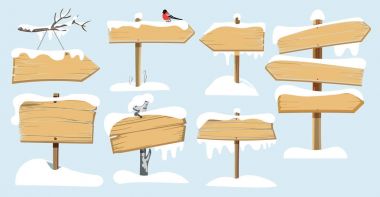set of wooden street signs in the snow clipart