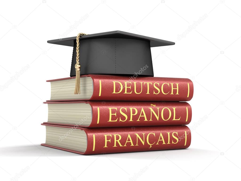 Graduation cap and Stack of dictionaries. Image with clipping path 