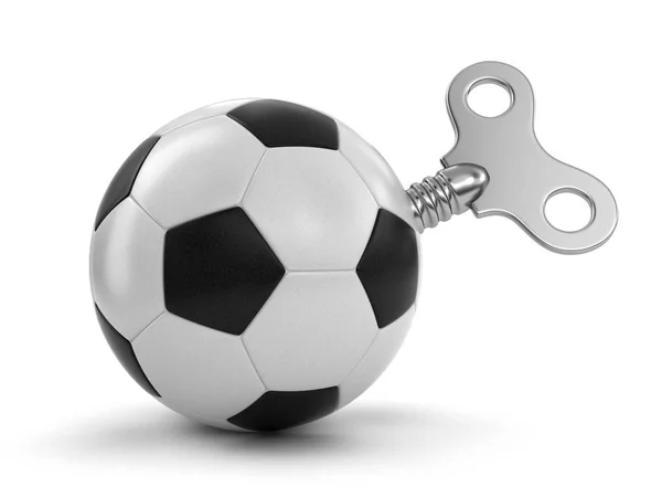 Soccer football with winding key. Image with clipping path — Stock Photo, Image