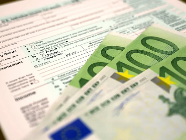 Daňový formulář 1040 a eura — Stock fotografie