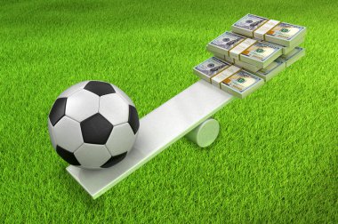 Futbol topu ve dolar tahta üzerinde dengeli. Görüntü kırpma yolu ile