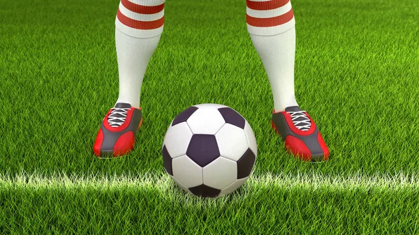 芝生の上のサッカー ボールを持つ男 — ストック写真