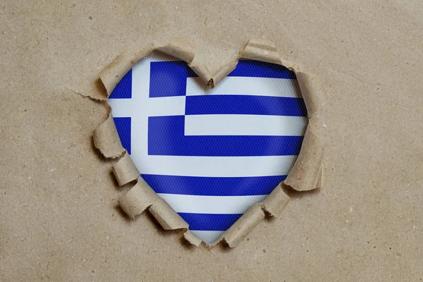 Heart Shaped Hole Torn Paper Showing Greek Flag — 스톡 사진