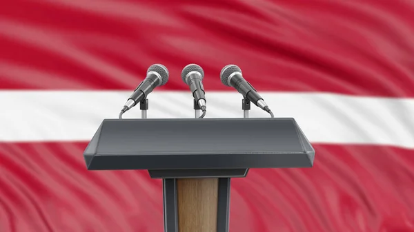 Podium Mit Mikrofonen Und Lettischer Flagge Hintergrund — Stockfoto
