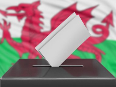 Ballot box with Welsh flag on background 