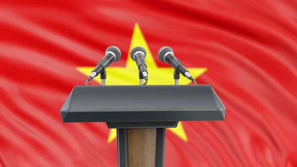 Podium lectern with microphones and Vietnamese Flag in background