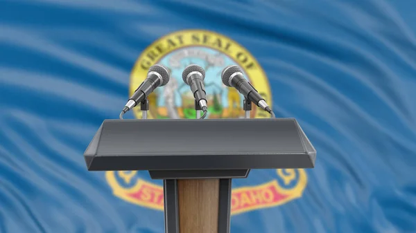 Podium Lectern Microphones Idaho Flag Background — Stock Photo, Image