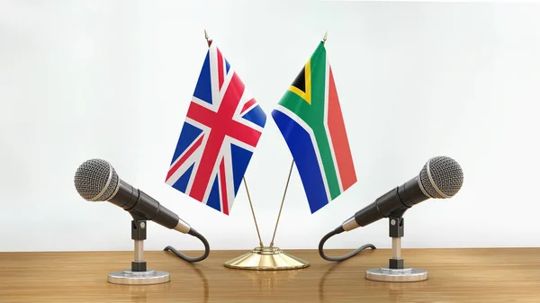 Microphones Flags Pair Desk Defocused Background — Stock Photo, Image