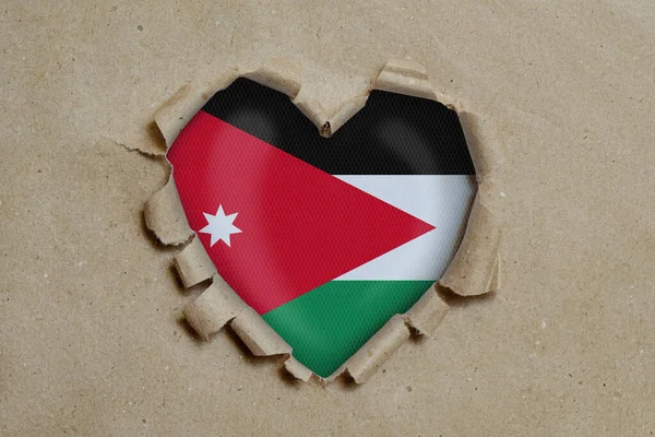 Agujero Forma Corazón Rasgado Través Papel Mostrando Bandera Jordania — Foto de Stock