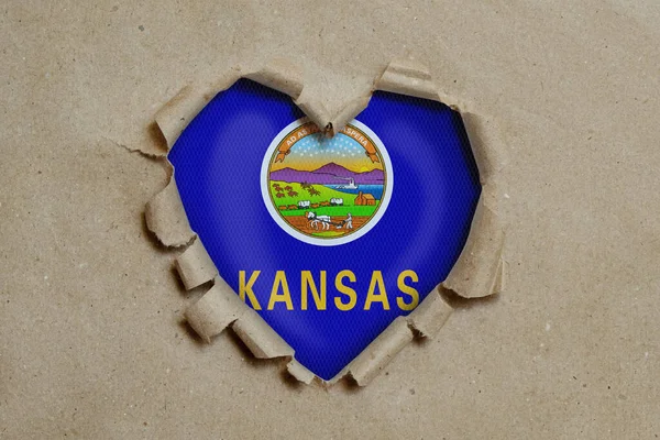 Heart Shaped Hole Torn Paper Showing Kansas Flag — Stock Photo, Image