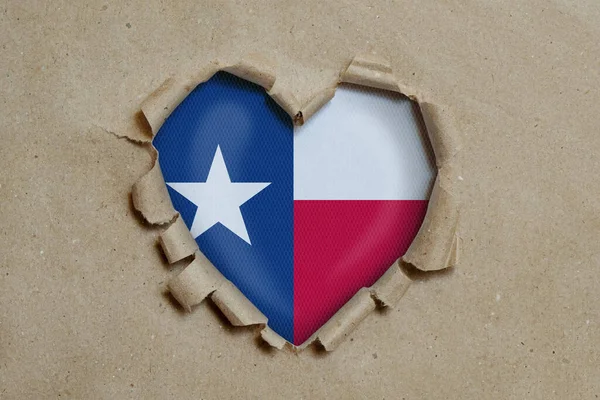 Hjärtformade Hål Slits Genom Papper Visar Texas Flagga — Stockfoto