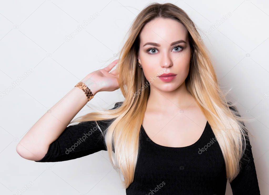 beautiful young woman with long hair wearing worst watch