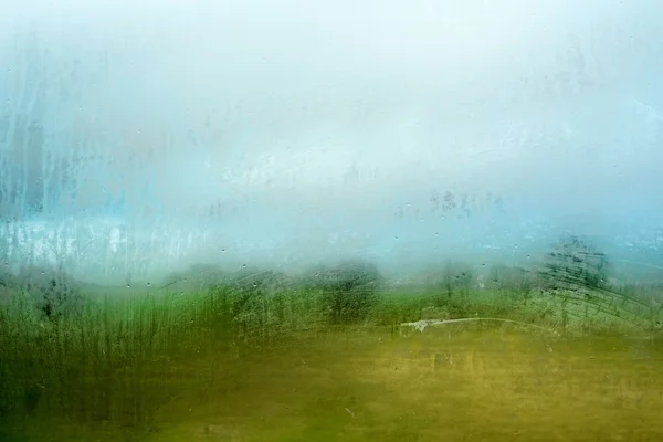 Landskap genom Fogged fönster — Stockfoto