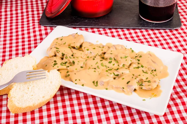 Spanish pork loin tapa on plate — Stock Photo, Image