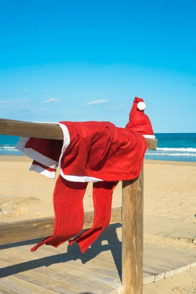 Santa on the beach — Stock Photo, Image