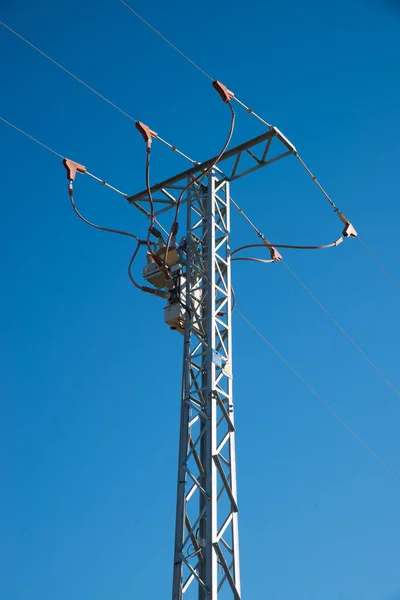 Large electricity pylon taken low angle — Stock Photo, Image
