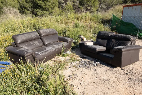 Furniture in a roadside dump Royalty Free Stock Images