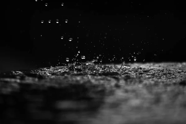 Many drops of water close-up in free fall — Stock Photo, Image