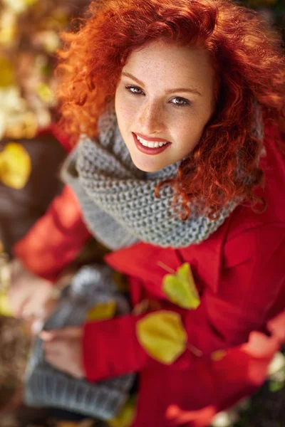 Ginger girl outside in autumn Royalty Free Stock Images