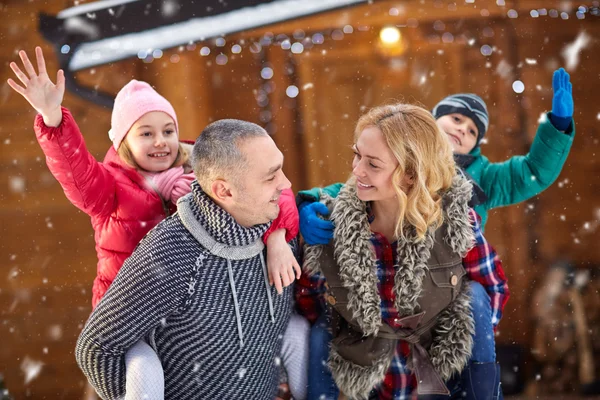 Beautiful smiling family enjoying on Christmas eve — Stock Photo, Image