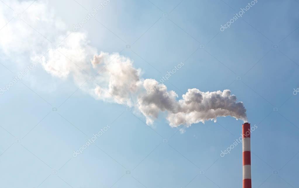 Air pollution with smoke from chimney