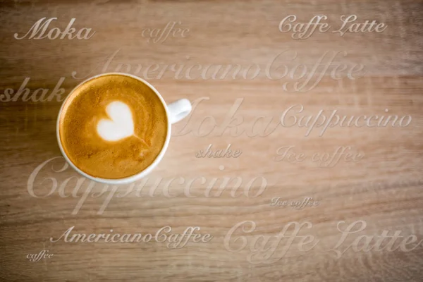 Latte art csésze kávé — Stock Fotó