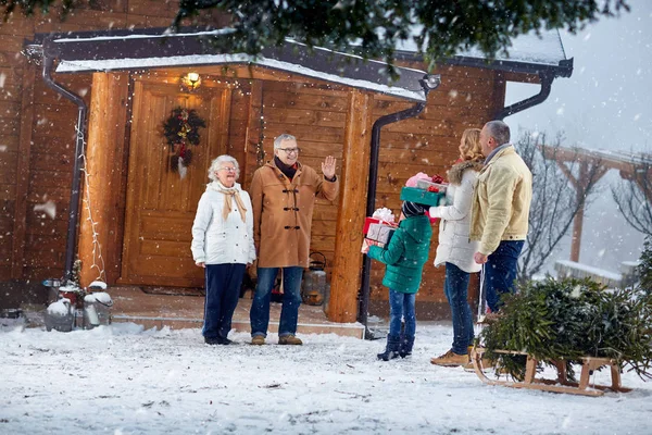 grandparents gathering family together for xmas eve