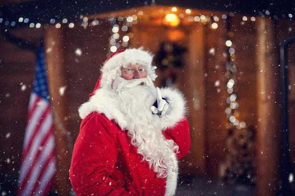 Weihnachtsmann hält Finger auf Mund — Stockfoto