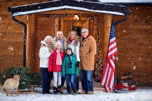 Portrait of happy family outdoor on xmas — Stock Photo, Image