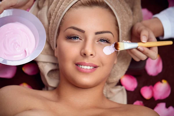 Smiling beautiful  woman with face mask — Stock Photo, Image