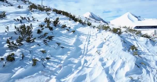 Aerial flight over snowy mountain at winter — Stock Video