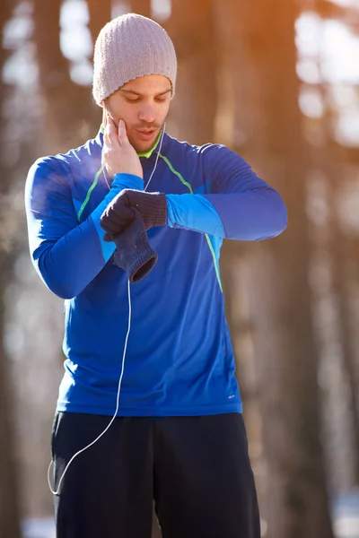 Jogger controls heart beats on training outdoor