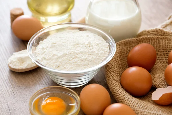 Eggs, flour and milk background — Stock Photo, Image