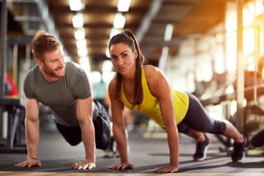 Couple on fitness training together clipart