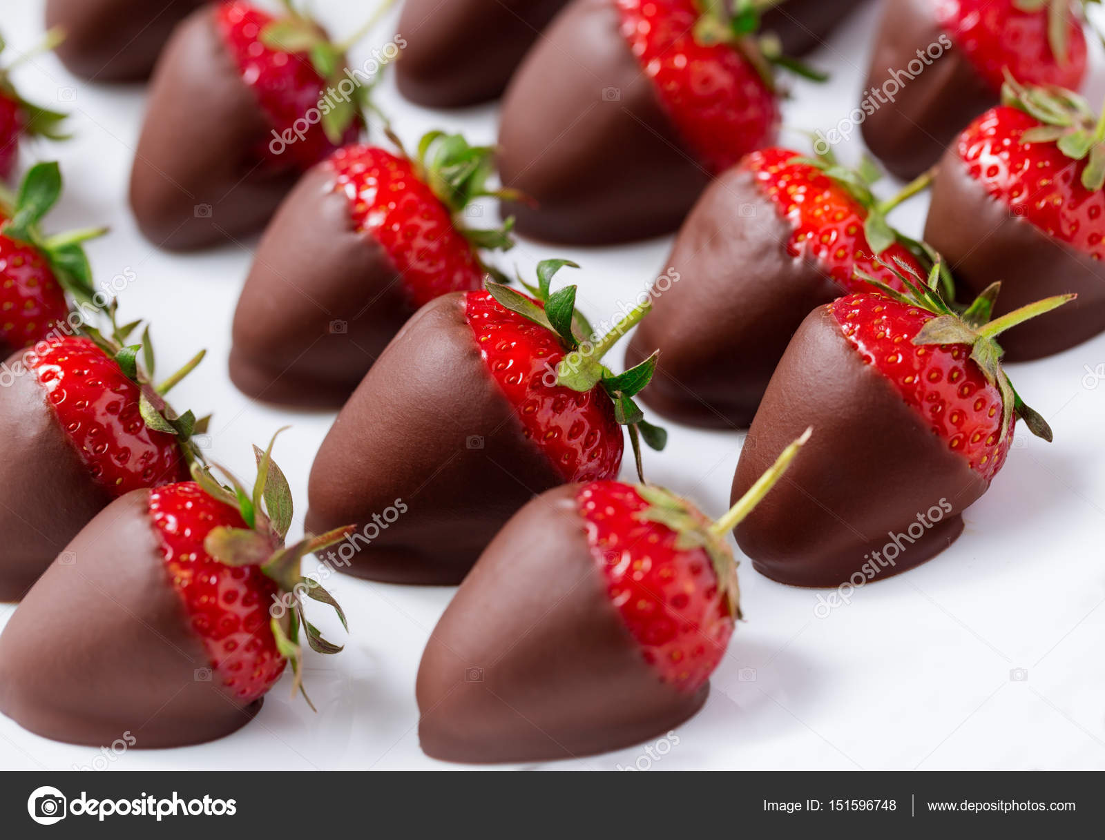 Strawberries in dark chocolate Stock Photo by ©luckybusiness 151596748