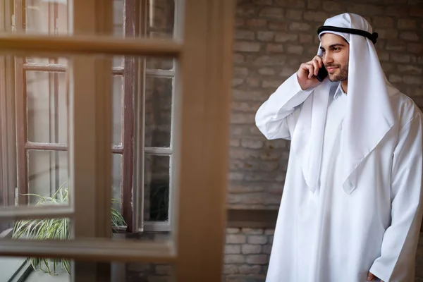 Arabic businessman speaking on phone — Stock Photo, Image