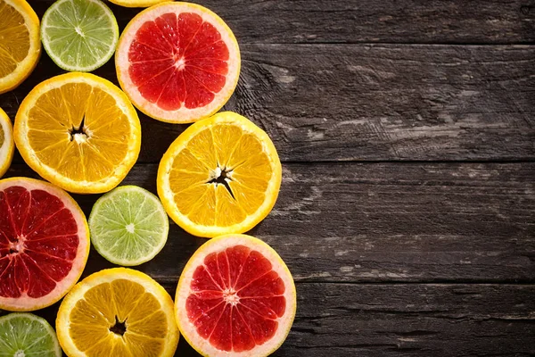 Verschillende segmenten van citrus achtergrond — Stockfoto