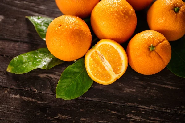 Fresh and juicy orange fruits on table — Stock Photo, Image