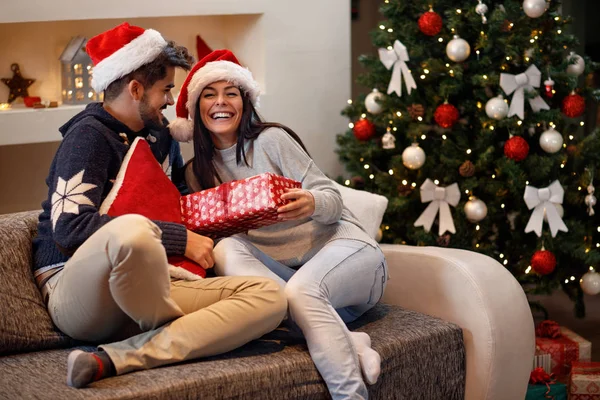 Girl receive present from boy for holiday — Stock Photo, Image