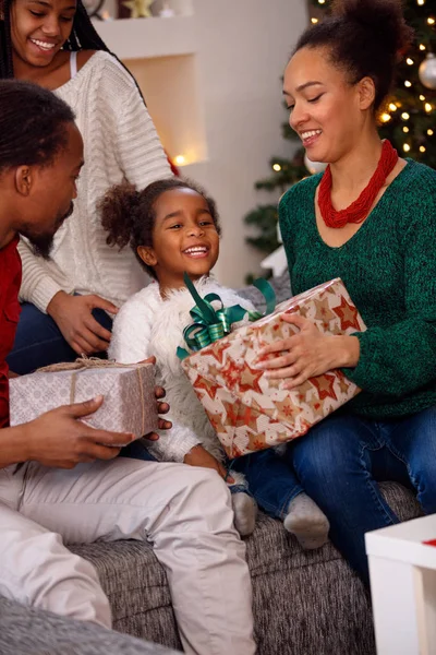 Afro American family opening present on Christmas — Stock Photo, Image