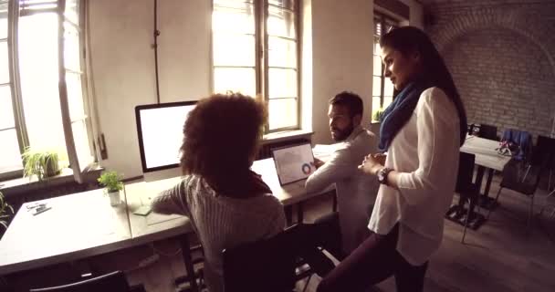 Group of young employees in office talking and working — Stock Video