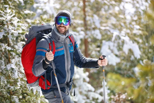 Man in action with hiking equipment — Stock Photo, Image