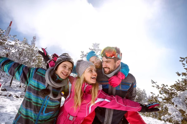 Happy family on skiing — Stock Photo, Image