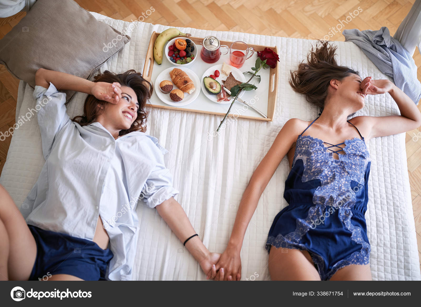 A gay couple in bed having sex Stockfotos, lizenzfreie A gay couple in bed having sex Bilder Depositphotos