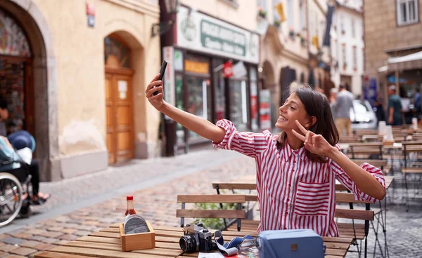 Young tourist female taking selfie in Prague. Enjoing on her own — Φωτογραφία Αρχείου