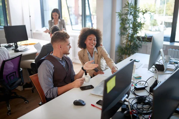 One Male Colleague Explaining Another Female Colleague Content Monitor Modern — 图库照片