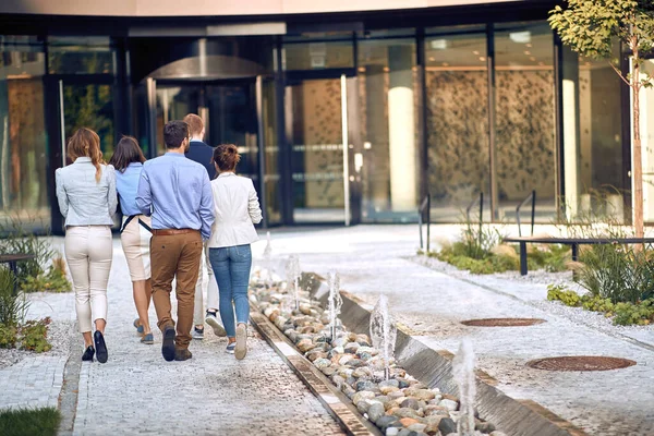 Group Young Employees Entering Business Building Returning Break — Stock Photo, Image